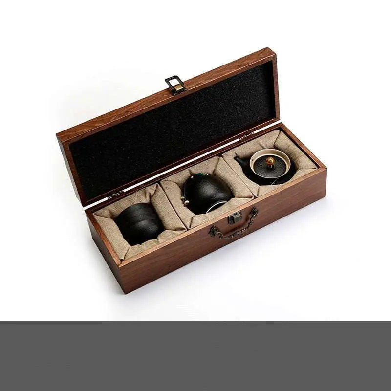 Ceramic Kung Fu tea set in elegant wooden gift box with traditional black teapot and cups