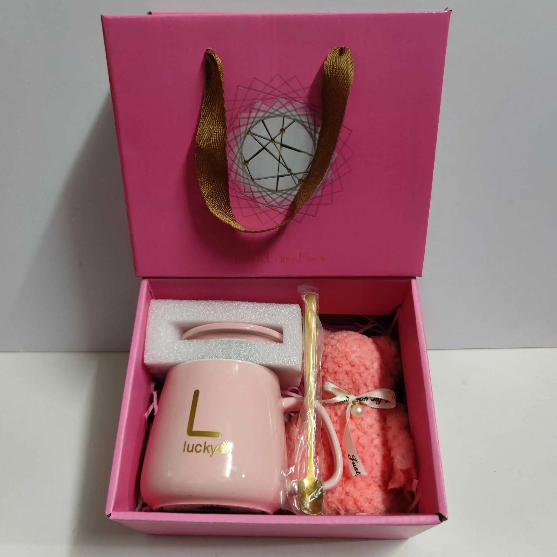 Pink ceramic cup gift box set with letter print mug, spoon, and towel in pink packaging