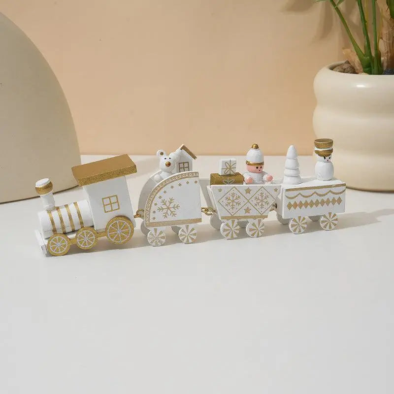 White and gold wooden train Christmas decoration with festive holiday ornaments