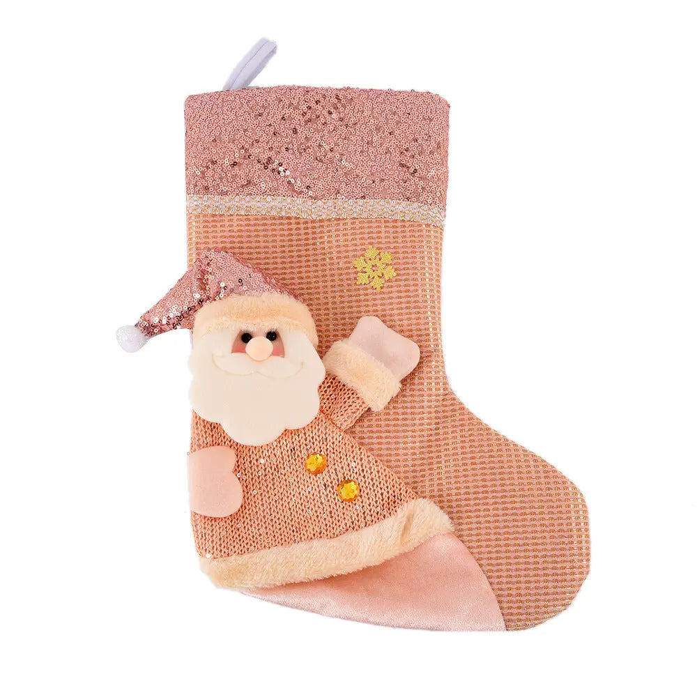 Handmade sequined Christmas stocking with Santa design in pink and beige tones, festive holiday gift bag.
