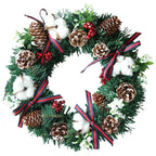 Handcrafted Christmas wreath hanging decoration with pinecones, red berries, cotton, and striped ribbons on PVC garland
