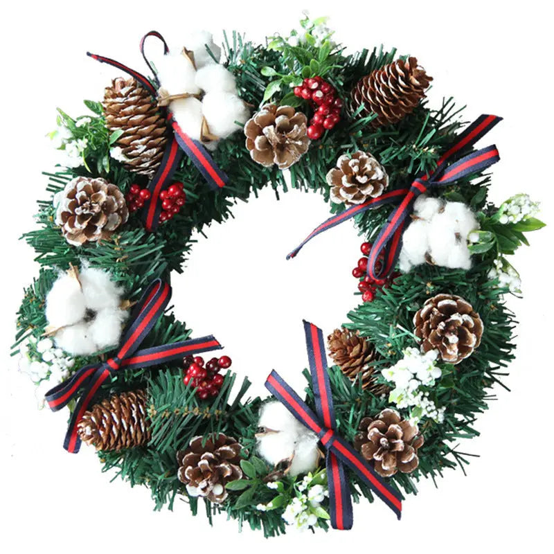 Handcrafted Christmas wreath hanging decoration with pinecones, red berries, cotton, and striped ribbons on PVC garland