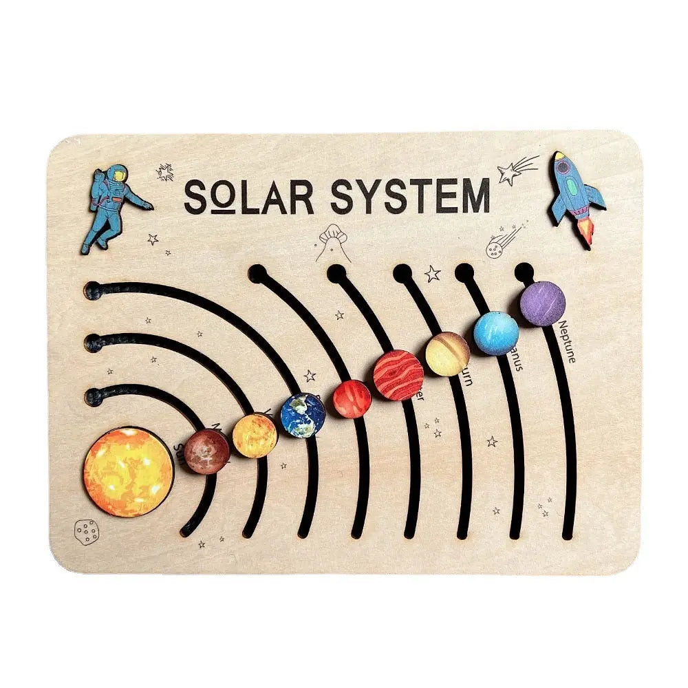 Solar system model with colorful planets on a wooden board