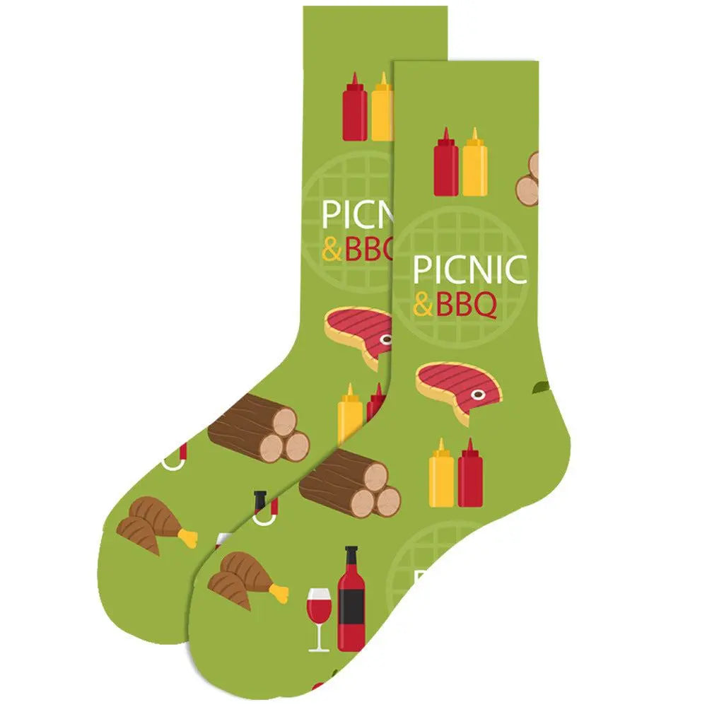 Festive men’s cotton socks with picnic and BBQ themed design on green mid-tube fabric