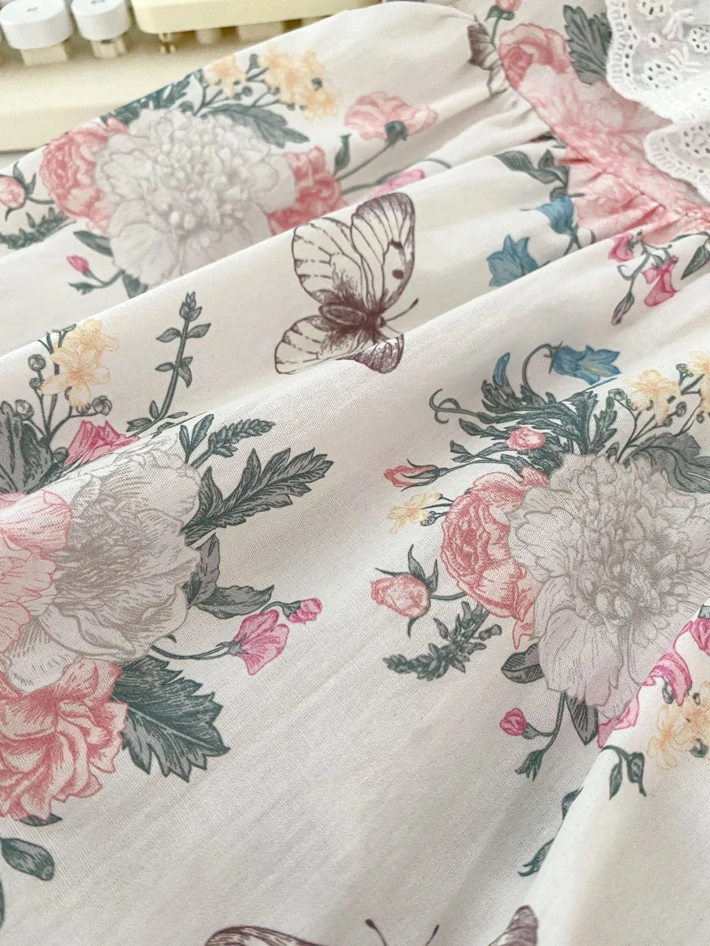 Vintage-style baby girls floral and butterfly pattern cotton dress in pink and beige